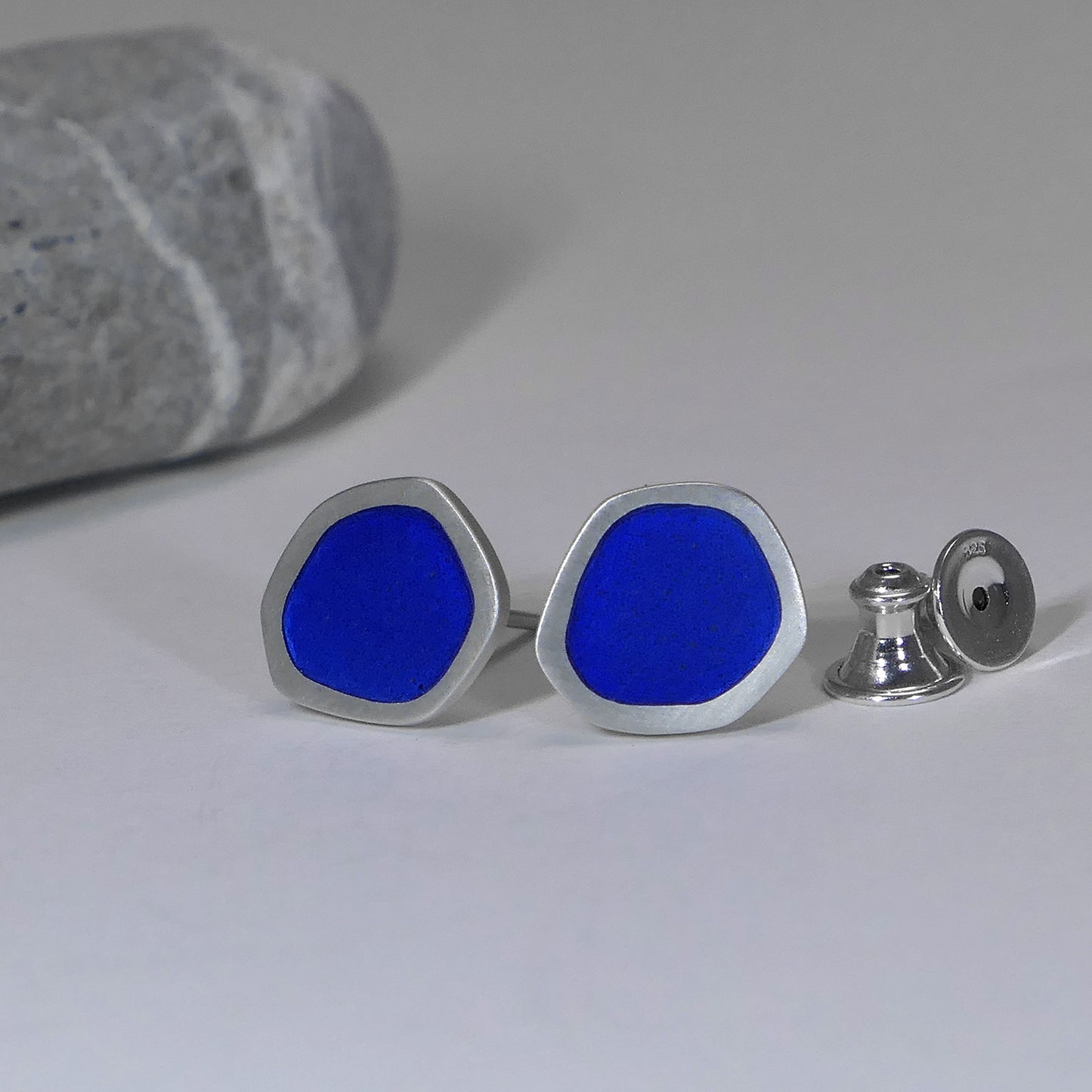 'Flat-boulder' ear studs, mid-blue vitreous enamel