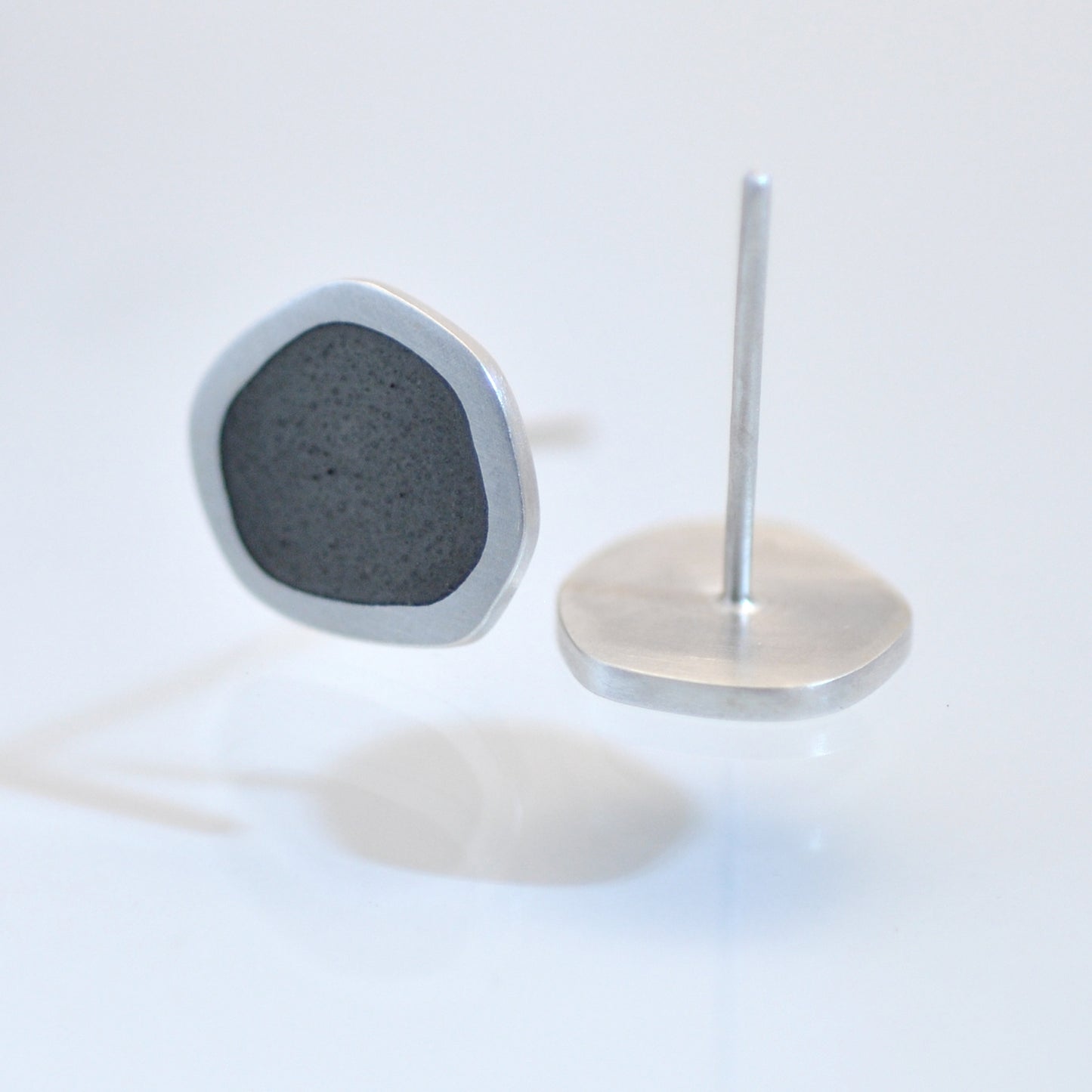 ‘Flat-boulder’ ear-stud, silver and earth-grey vitreous enamel