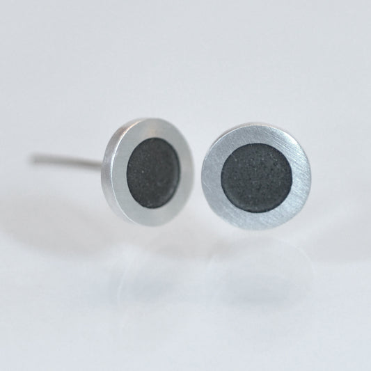 Small round silver flat ear studs, earth grey