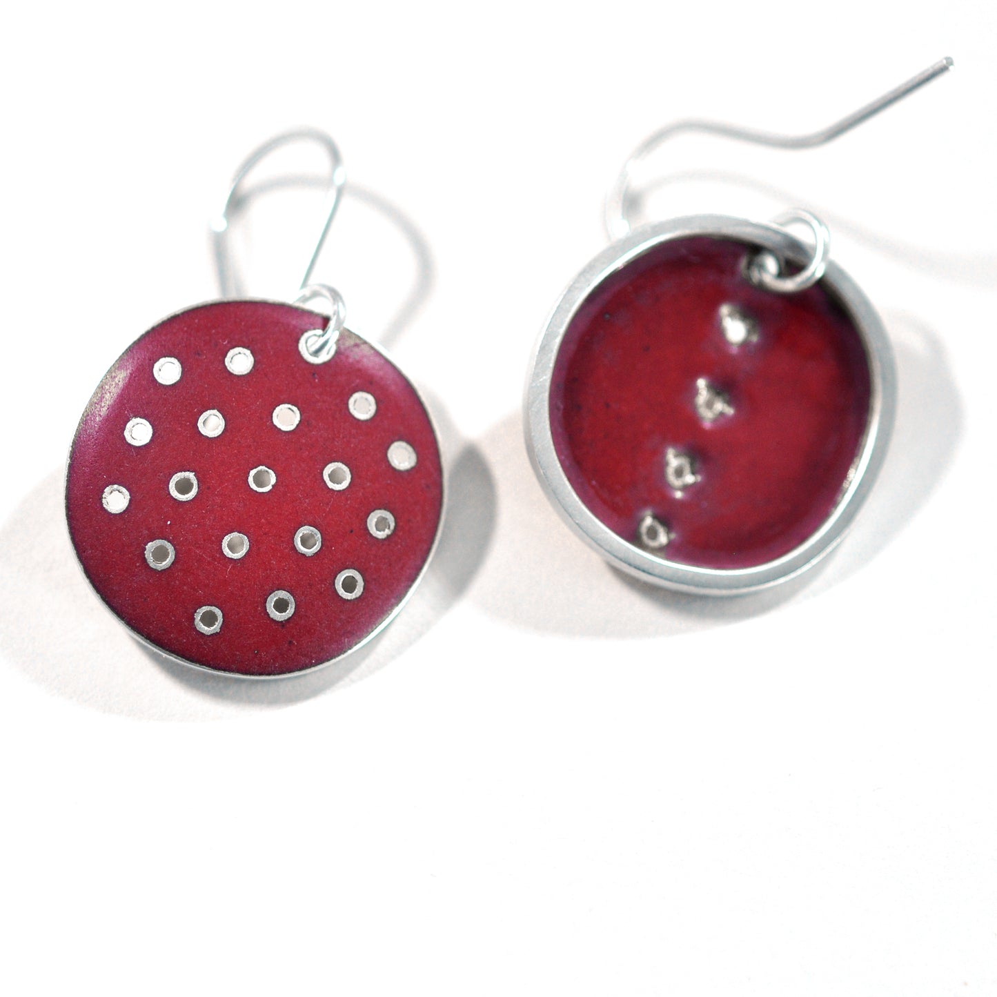Red polka-dot earrings, odd-pair