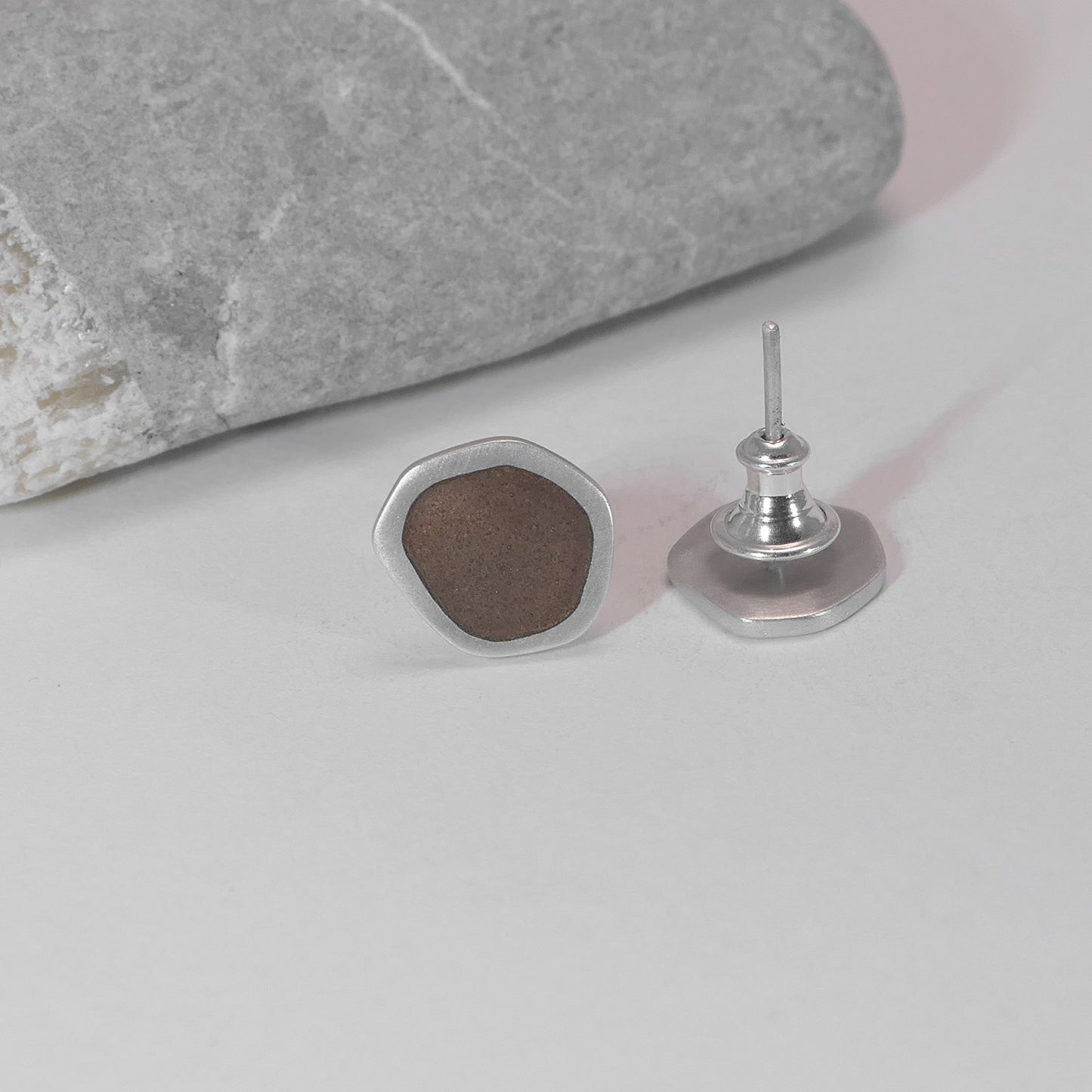 ‘Flat - Boulder’ ear studs. Sterling silver and vitreous enamel, brown