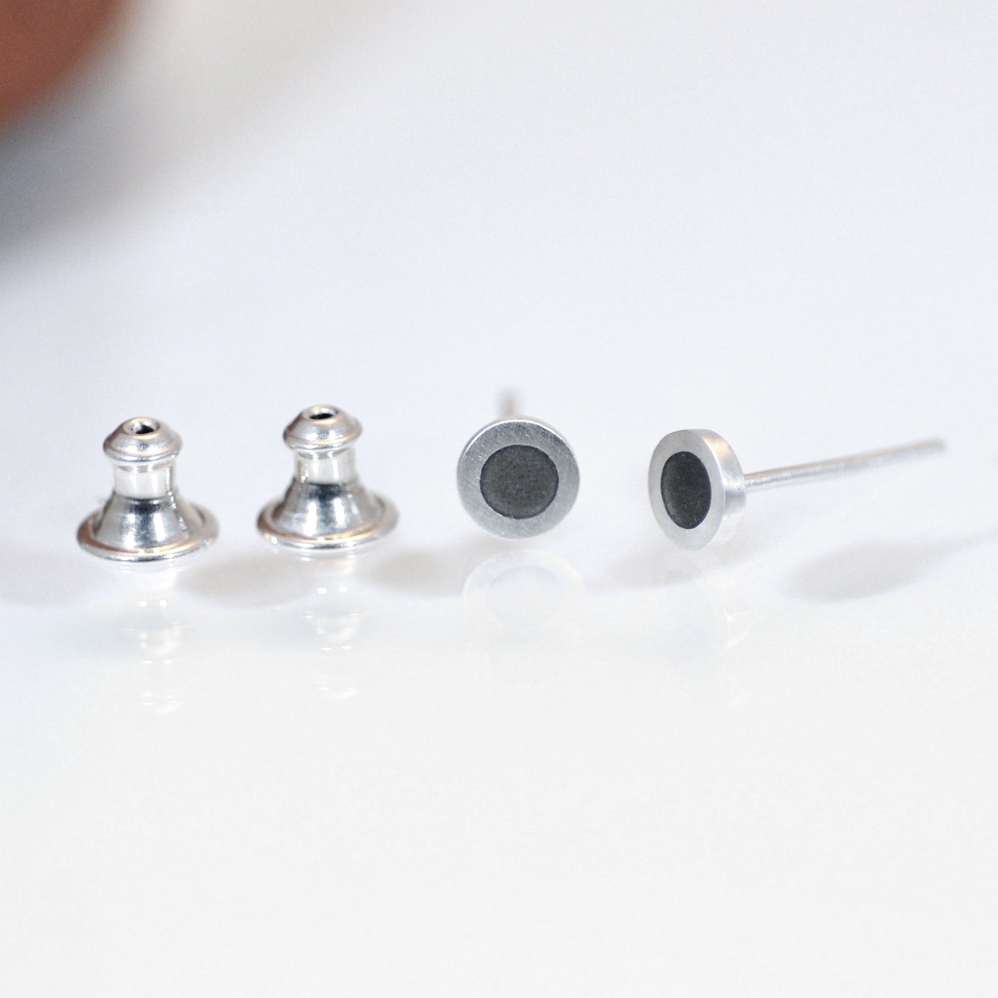 Tiny Round silver and enamel ear-studs, this colour, earth grey