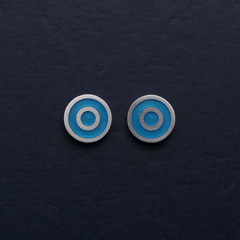 Small-flat-round-ear-studs-with-turquoise-blue-coloured-enamel-in-the-centre