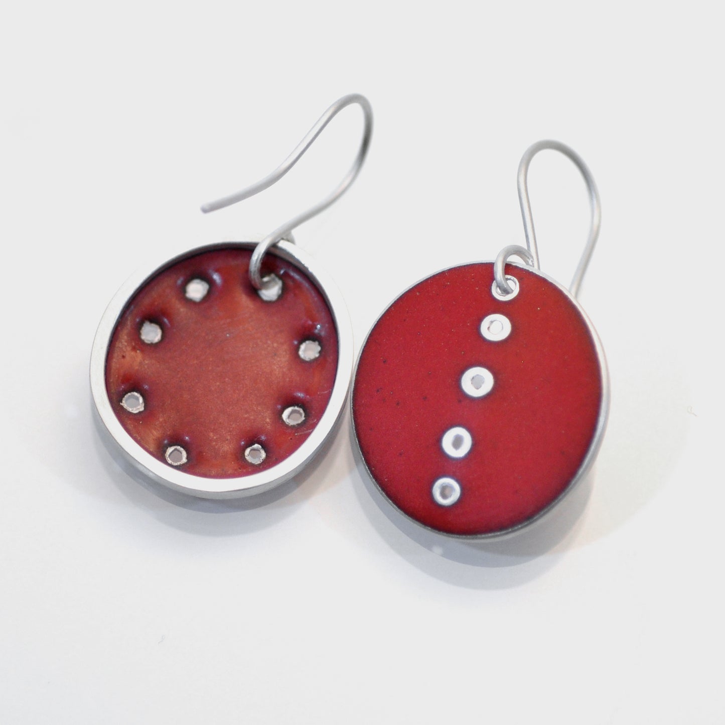 Red odd pair of earrings