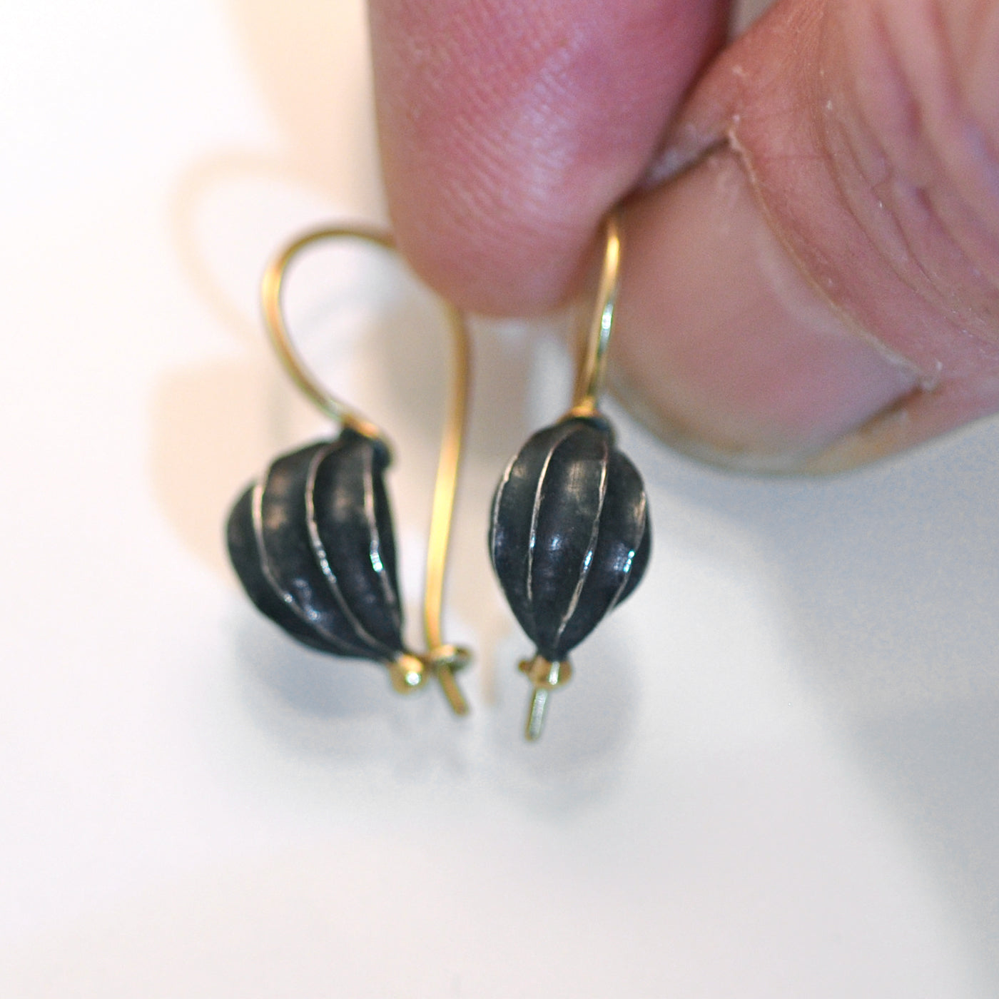 Fat seed pod earrings, oxidised silver with 18ct Gold wire