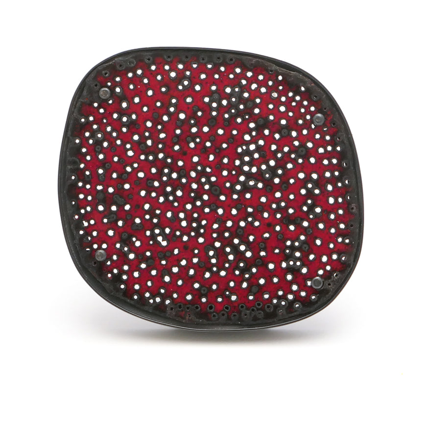Brooch, perforated red enamel surface