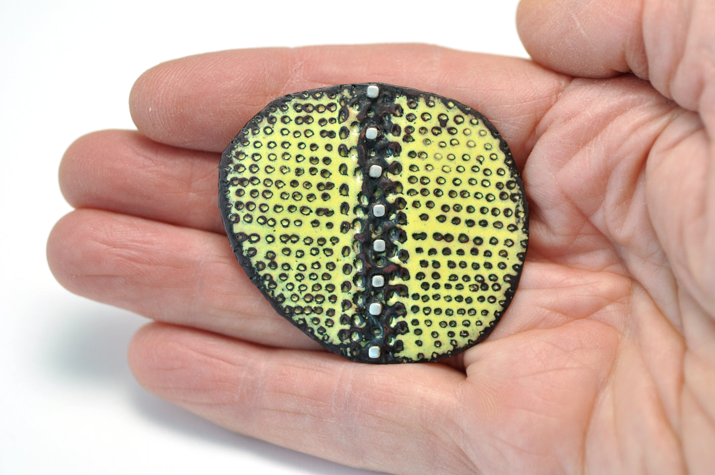 Yellow Brooch with silver square rivets