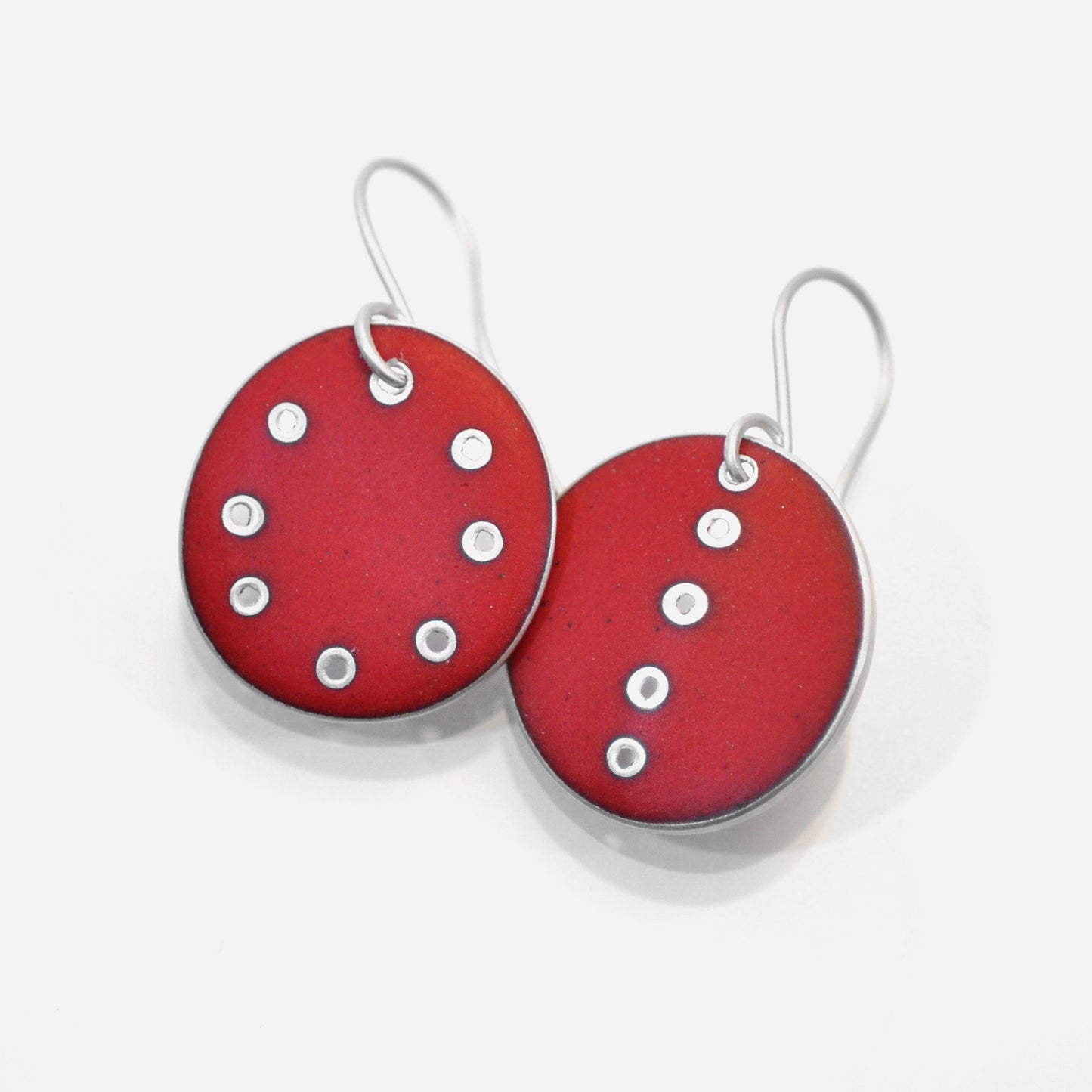 Red odd pair of earrings